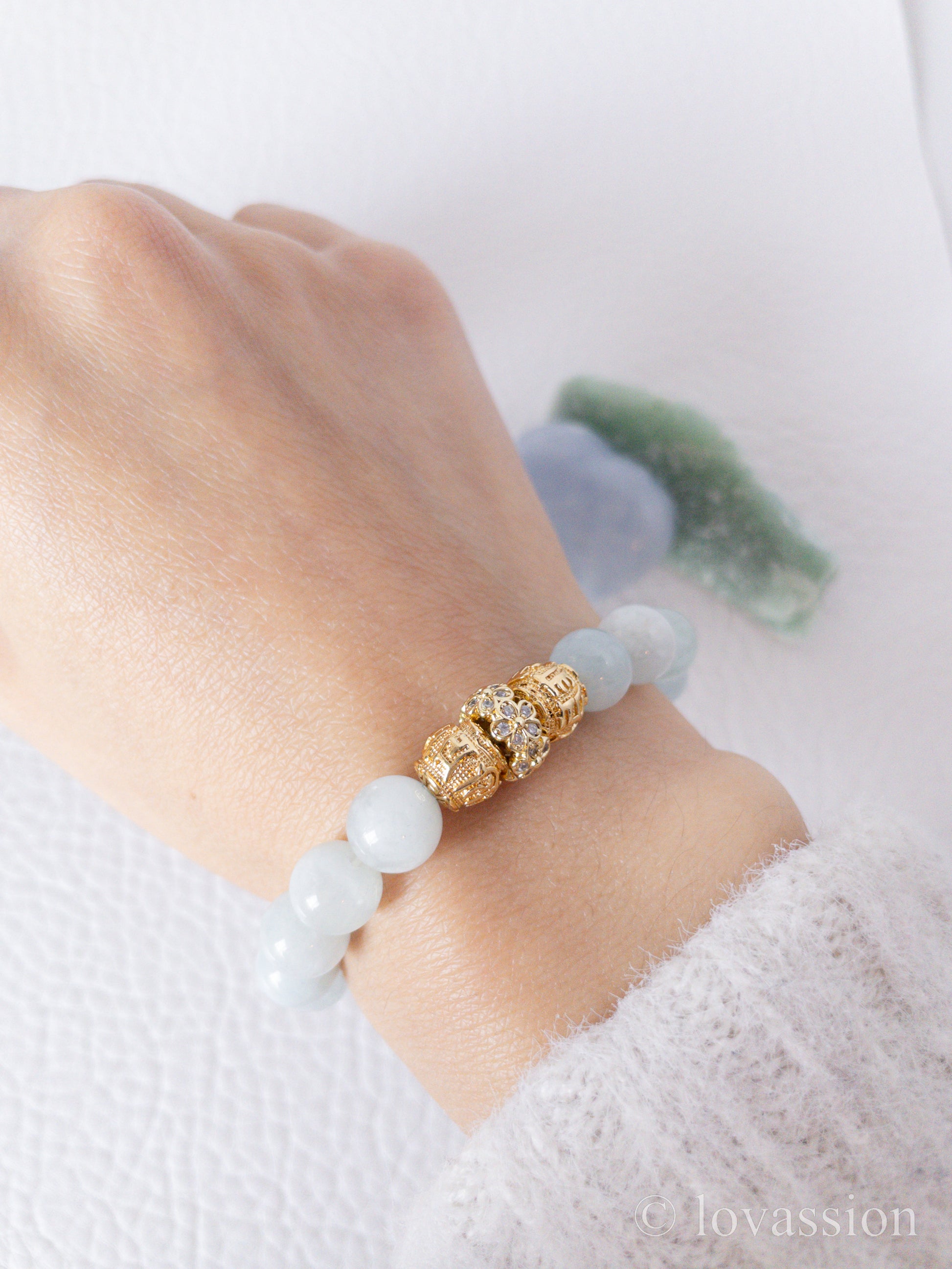 8mm aquamarine bracelet on hand