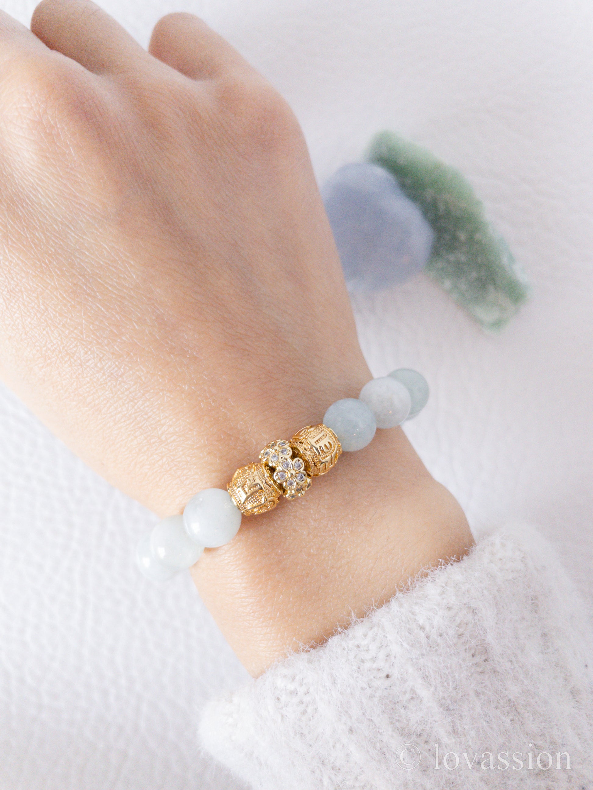 8mm aquamarine bracelet on hand