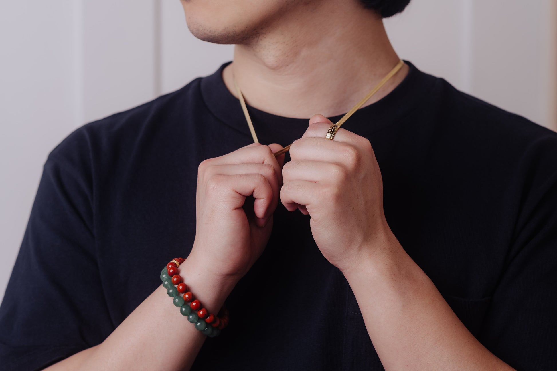 men wearing herringbone necklace