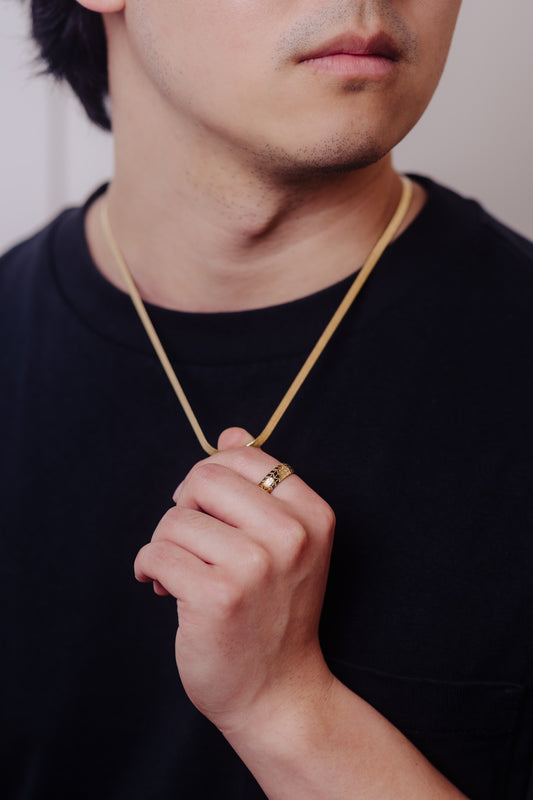 men wearing herringbone necklace